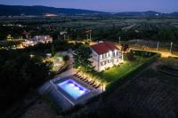 an aerial view of a house with a swimming pool at Villa Matko - family destination in Zmijavci