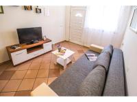 Televízia a/alebo spoločenská miestnosť v ubytovaní Cozy and nice apartment