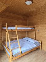 Posteľ alebo postele v izbe v ubytovaní Ozi-Holiday
