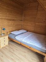 Posteľ alebo postele v izbe v ubytovaní Ozi-Holiday
