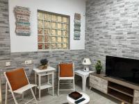 Televízia a/alebo spoločenská miestnosť v ubytovaní Milan Soria Luxury House