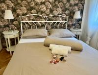 Postel nebo postele na pokoji v ubytování Apartments & Villa Tisno