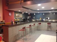 A restaurant or other place to eat at Hostal El Poligono