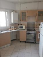 Kuchyň nebo kuchyňský kout v ubytování Appartement meublé