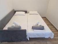 Postel nebo postele na pokoji v ubytování Coral Boutique Apartments