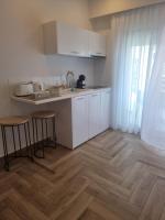 Kuchyň nebo kuchyňský kout v ubytování Coral Boutique Apartments