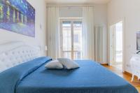 A bed or beds in a room at Elena House Apartments