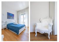 A bed or beds in a room at Elena House Apartments