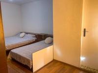 Postel nebo postele na pokoji v ubytování Alpin Guest House