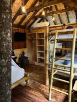 Postel nebo postele na pokoji v ubytování Khao Sok Paradise Resort