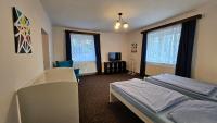 Postel nebo postele na pokoji v ubytování Rodinný apartmán U Kuby