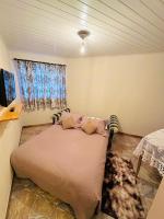 Casa para temporadaにあるベッド