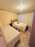 Casa para temporadaにあるベッド