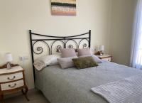 A bed or beds in a room at Los tres castells