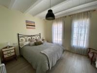 A bed or beds in a room at Los tres castells