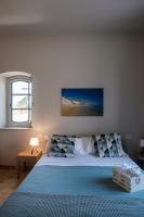 Posteľ alebo postele v izbe v ubytovaní B&B Fermata 106 da Carolina