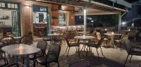 Reštaurácia alebo iné gastronomické zariadenie v ubytovaní Paleo Inn Hotel
