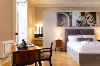 Posteľ alebo postele v izbe v ubytovaní Divisi Suites & SPA