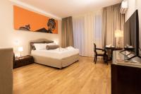 Posteľ alebo postele v izbe v ubytovaní Divisi Suites & SPA