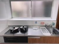 大和戸建にあるキッチンまたは簡易キッチン