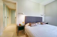 A bed or beds in a room at Villa Gran Canaria Specialodges