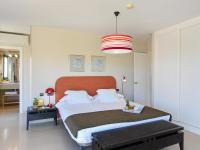 A bed or beds in a room at Villa Gran Canaria Specialodges