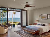 a bedroom with a bed and a view of the ocean at Andaz Maui at Wailea Resort - A Concept by Hyatt in Wailea