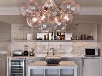 a kitchen with a sink and a chandelier at Andaz Maui at Wailea Resort - A Concept by Hyatt in Wailea