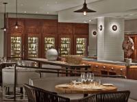 a restaurant with tables and chairs and a bar at Andaz Maui at Wailea Resort - A Concept by Hyatt in Wailea