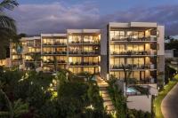 an apartment building at night with lights at Andaz Maui at Wailea Resort - A Concept by Hyatt in Wailea