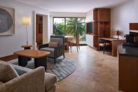 a living room with a couch and a table at Andaz Maui at Wailea Resort - A Concept by Hyatt in Wailea