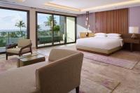 a bedroom with a bed and a living room at Andaz Maui at Wailea Resort - A Concept by Hyatt in Wailea