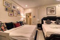 Postel nebo postele na pokoji v ubytování Rattana House Homestay