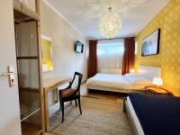 Postel nebo postele na pokoji v ubytování Apartmány Nad ZOO