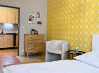 Postel nebo postele na pokoji v ubytování Apartmány Nad ZOO