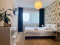 Postel nebo postele na pokoji v ubytování Apartmány Nad ZOO