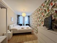 Postel nebo postele na pokoji v ubytování Apartmány Nad ZOO