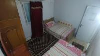 Postel nebo postele na pokoji v ubytování TM team- Elsohagy apartment