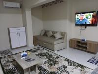 TV a/nebo společenská místnost v ubytování Apartment Hossam 2 - Hurghada