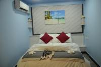 Postel nebo postele na pokoji v ubytování Isle Inn Guesthouse