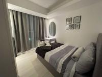 High-end 2BR Condo Boracay Tower - Azure Residences near Manila Airportにあるベッド