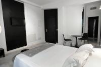 Posteľ alebo postele v izbe v ubytovaní Innova Spaces Málaga