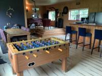 a room with a large chess board on a table at Rödvattnet cottages in Rödvattnet