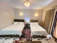 Postel nebo postele na pokoji v ubytování Savor Star pyramids hotel