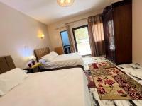 Postel nebo postele na pokoji v ubytování Savor Star pyramids hotel
