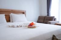 Urbanview Villa Pondok Uma Sari near Ubudにあるベッド