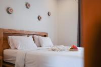 Urbanview Villa Pondok Uma Sari near Ubudにあるベッド