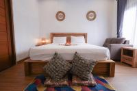 Urbanview Villa Pondok Uma Sari near Ubudにあるベッド