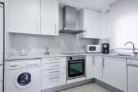 Kuchyňa alebo kuchynka v ubytovaní Apartamentos Sonido de Mar