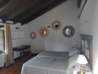 Łóżko lub łóżka w pokoju w obiekcie Hotel Rural Natxiondo